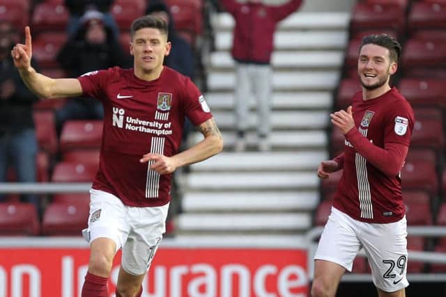 Alex Revell celebrates his final goal for the Cobblers, in the 3-1 win over Southend United earlier this month