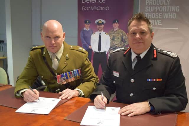 Lieutenant Colonel John Hanson signed the Covenant with Chief Fire Officer Darren Dovey.