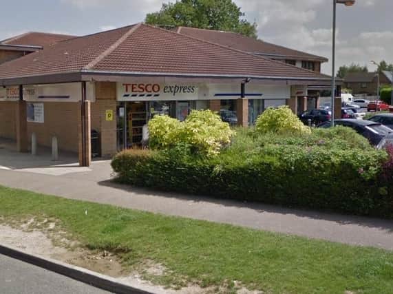 The two men broke into the Tesco Express in Bordeaux Close, Duston, using crowbars.