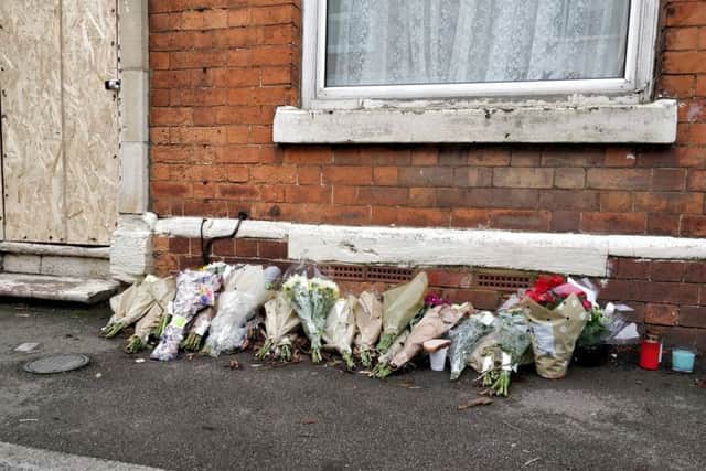 Flowers left outside Tairu Jallow's house in Kettering