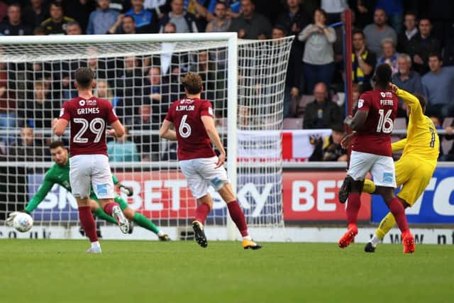 AFC Wimbledon claimed their first ever win over Northampton in the reverse fixture courtesy of Harry Forrester's fine strike