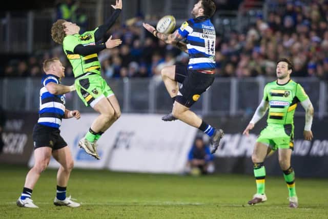 Jamie Gibson competing for a high ball