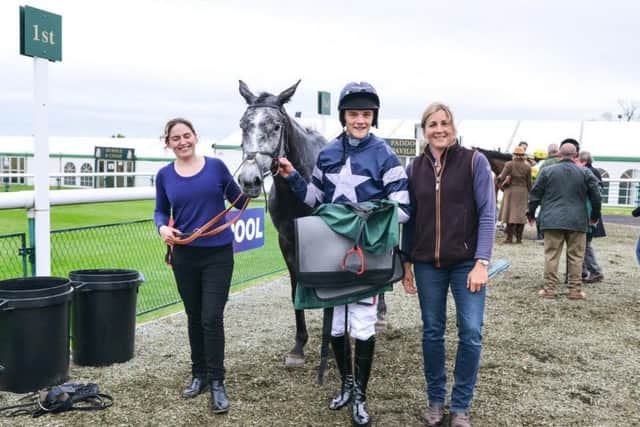Goodnight Charlie pictured after winning at Towcester in May with jockey Sam Davies-Thomas and trainer Caroline Fryer (right)