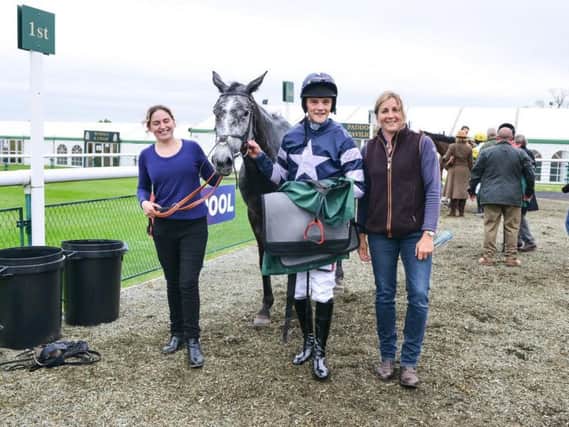 Goodnight Charlie pictured after winning at Towcester in May with jockey Sam Davies-Thomas and trainer Caroline Fryer (right)