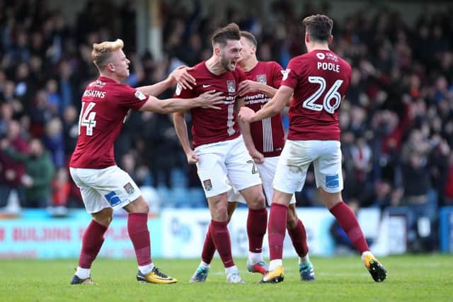 Matt Grimes scored a superb free-kick to hand the Cobblers all three points in October's reverse fixture. Pictures: Sharon Lucey