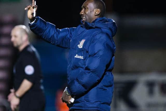 Jimmy Floyd Hasselbaink watched his team lose to Gillingham at Sixfields on Tuesday (Picture: Kirsty Edmonds)