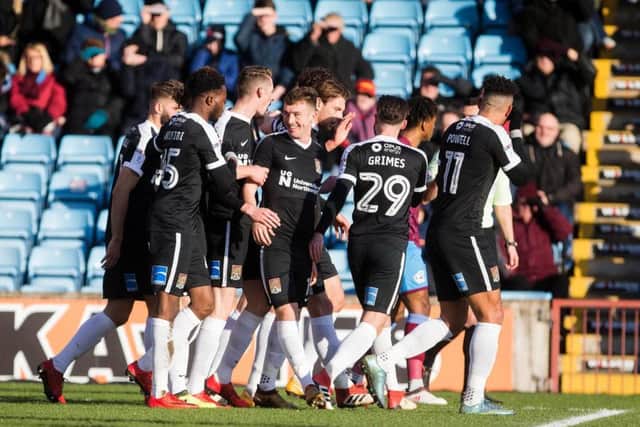 Chris Long is congratulated for his ninth goal of the season