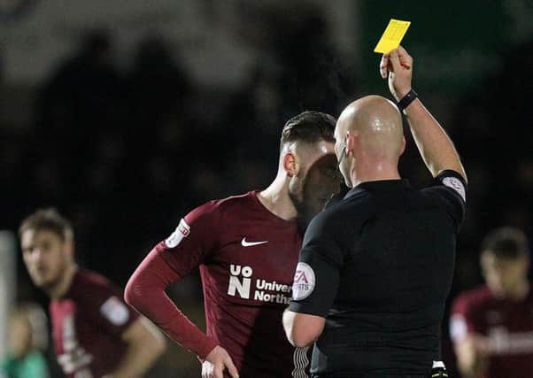 BOOKED: Matt Grimes will get a two-game ban if he picks up a yellow card in any of the next three games