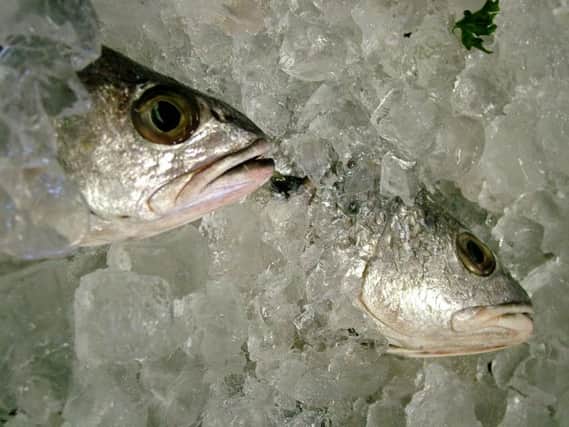 Trading Standards says door to door salesmen have been spotted in Northamptonshire selling overpriced fish.