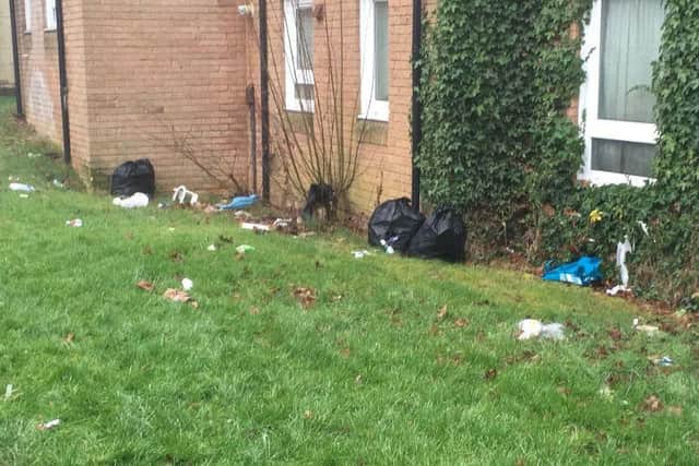 Litter outside the windows of houses in the east of Northampton has not been cleared for several days, Councillor Meredith says.