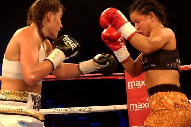 Chantelle Cameron in the ring with Viviane Obenauf.