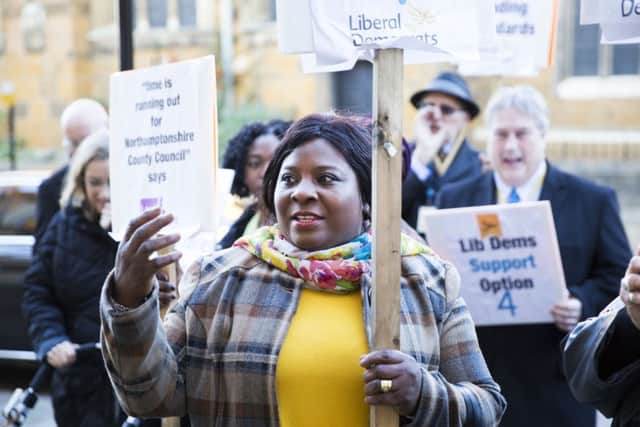 A protest late last year over proposed library service cuts