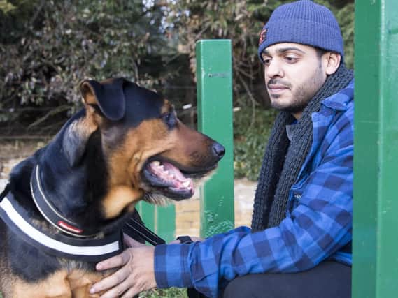 Vinial Tailor with his German Shepherd and rottweiler cross, Django pictured in Dallington Park.