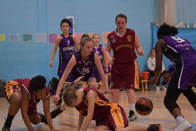 GRAB THE BALL! - action from Northants Lightning Under-16 Girls' heavy defeat to Northamptonshire Titans (Pictures: Dave Ikin)