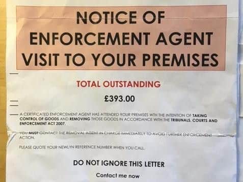 Bailiff letters like this are sent to residents demanding payments. One resident described them as "threatening and bullying".