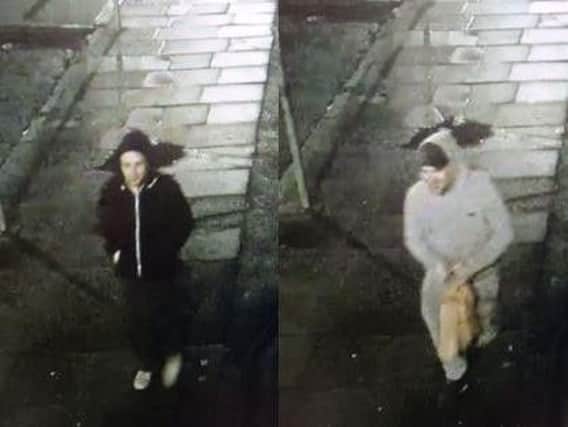 Police want to speak to these men after a Northampton shop was vandalised.