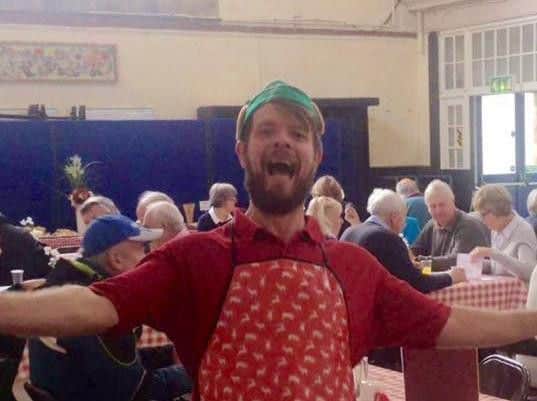 Andrew (pictured at the Relax and Unwind cafe) is urging more people to  make use of the scheme during the cold snap.