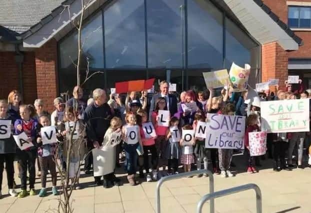 Protesters, in November last year, stood side-by-side in a bid to keep their beloved library open