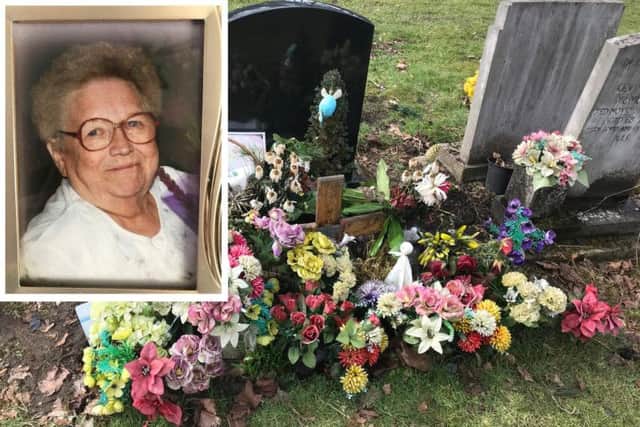 Ann O'Sullivan's grave was left "wrecked" by workmen, says her daughter, who found vases broken and flowers trampled.