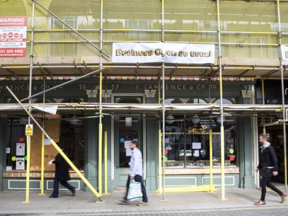 Lawrence's coffee shop in St Giles Street shut last year after the Oliver Adams company went bust. it could now be turned into a restaurant and flats.