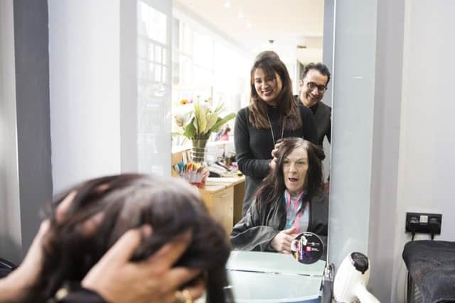Sandra Clark, 48 has lived in Oasis House since August after camping in the graveyard opposite. It's the first time she has had her haircut since her daughter's wedding three years ago.