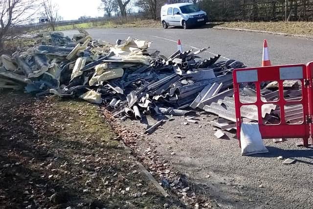 The building material was dumped by the side of the road in Evenley.