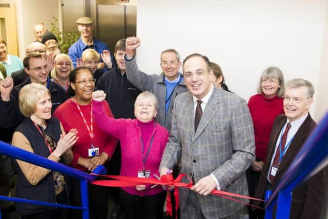 MP for Northampton North Michael Ellis cutting the ribbon at Spencer Contact on Friday (March 9).