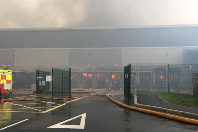 A man has been arrested on suspicion of arson following the fire in Daventry today.