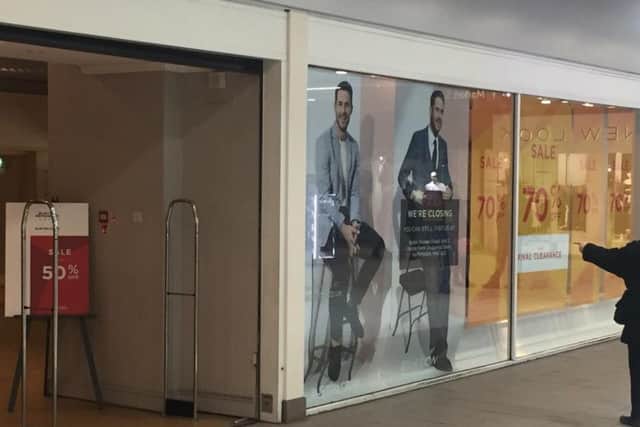 Closing down signs have gone up in the window of Burton