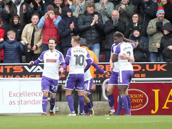The Rotherham players celebrate Michael Smith's opening goal at Sixfields (Pictures: Sharon  Lucey)