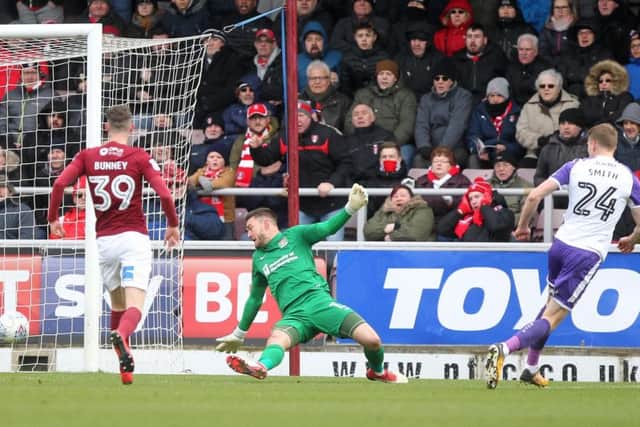 Michael Smith slots home Rotherham's first goal