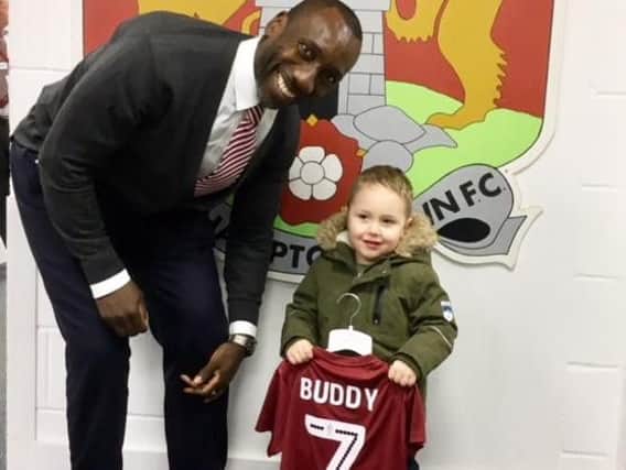Buddy met Jimmy Floyd Hasselbaink at the Rotherham game in Sixfields on Saturday and received a free personalised kit and match tickets.