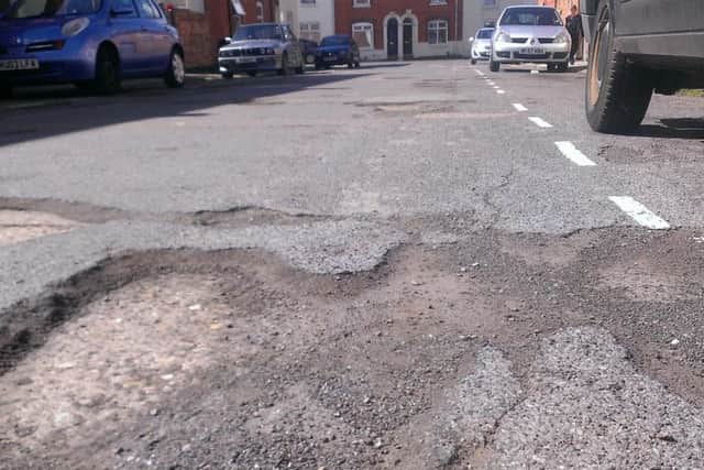 Potholes in Military Road, Northampton.