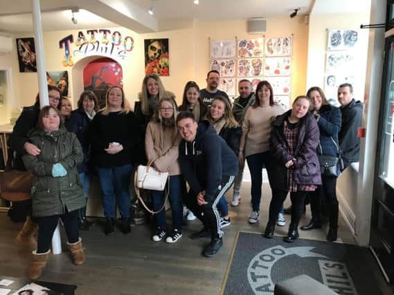 Down Syndrome Group Northamptonshire pictured on Saturday before getting their tattoos in Bridge Street.
