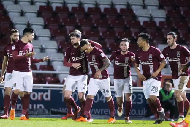 The Cobblers players celebrate Shay Facey's first-half goal against Shrewsbury (Pictures: Kirsty Edmonds)