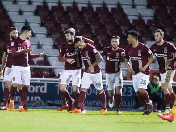 The Cobblers players celebrate Shay Facey's first-half goal against Shrewsbury (Pictures: Kirsty Edmonds)