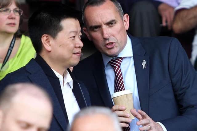 5USport's CEO Tom Auyeung and Cobblers chairman Kelvin Thomas pictured at a match at Sixfields in October