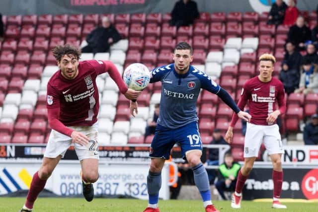Matt Crooks has his eyes on the ball during the Cobblers' defeat to Charlton (Pictures: Kirsty Edmonds)