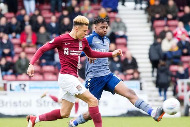 Shaun McWilliams battles for possession