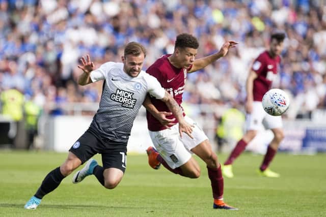 Shaun McWilliams battle for the ball in August's clash at Sixfields