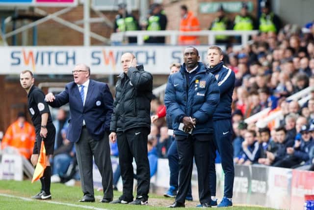 Jimmy Floyd Hasselbaink and opposing number Steve Evans. Picture by Kirsty Edmonds