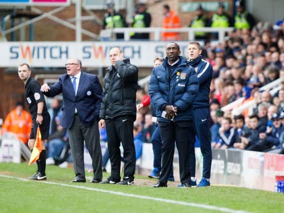 Jimmy Floyd Hasselbaink and opposing number Steve Evans. Picture by Kirsty Edmonds