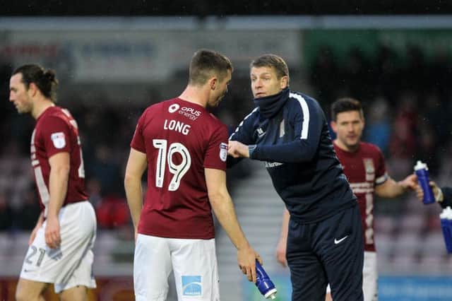 Dean Austin and Jon Brady have been placed in temporary charge of the Cobblers