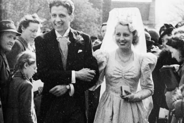 The couple pictured in Kettering Road back in 1945 - Dorothy has now given her dress to the Abington Park museum.