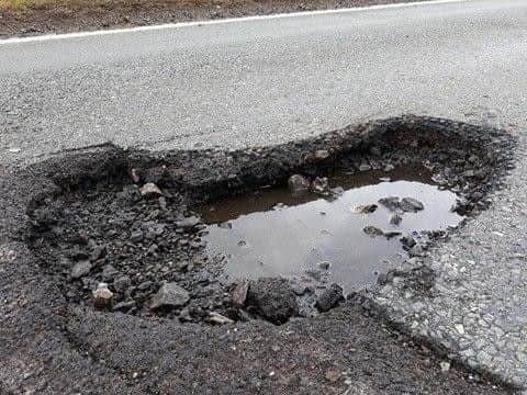 The six-inch deep monster hole was then hit by another car seconds later.