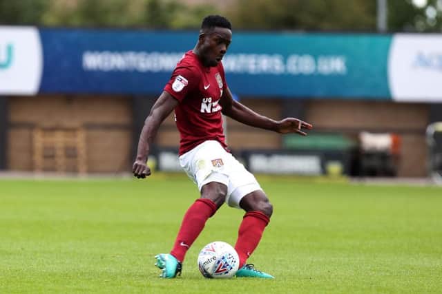 BACK IN THE FOLD: Leon Barnett made his first start since December against Peterborough on Easter Monday