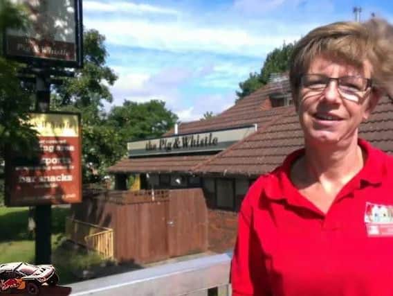 Manager of Blackthorn Good Neighbours, Kathryn White, in front of the Pig and Whistle pub in July 2014. (File picture).