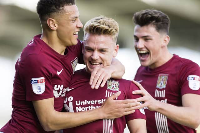 MATCH-WINNER: Sam Hoskins celebrates after scoring the only goal of the game in October's reverse fixture.
