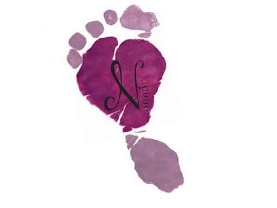 The Niamh's Legacy heart badge is Rob's daughter's footprint, who he lost four days before she was due.