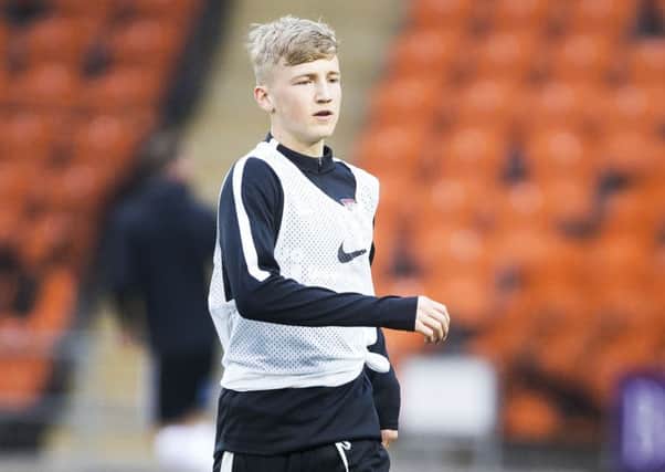 Morgan Roberts was on the bench for Tuesday's clash at Blackpool (Pictures: Kirsty Edmonds)